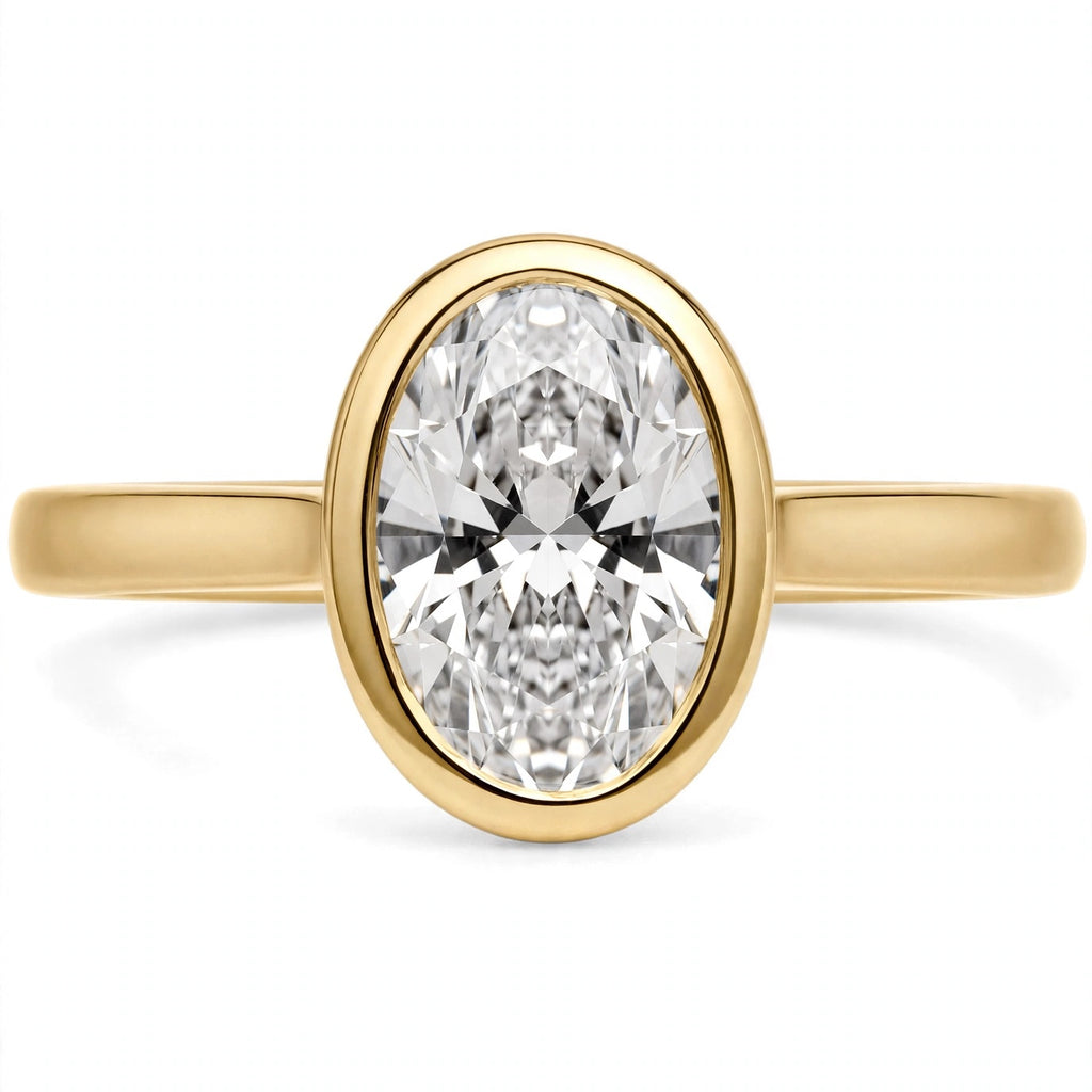 2.50 CT BEZEL-SET OVAL BRILLIANT LAB DIAMOND RING • F COLOR • 14K YELLOW GOLD • VS1 • IGI CERTIFIed