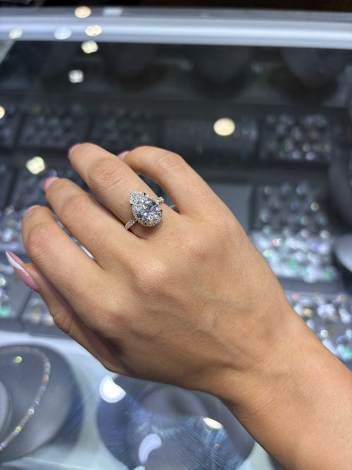 4.79 CT PEAR BRILLIANT LAB DIAMOND RING • 4.05 CT CENTER • E COLOR • VS1 • IGI CERTIFIED