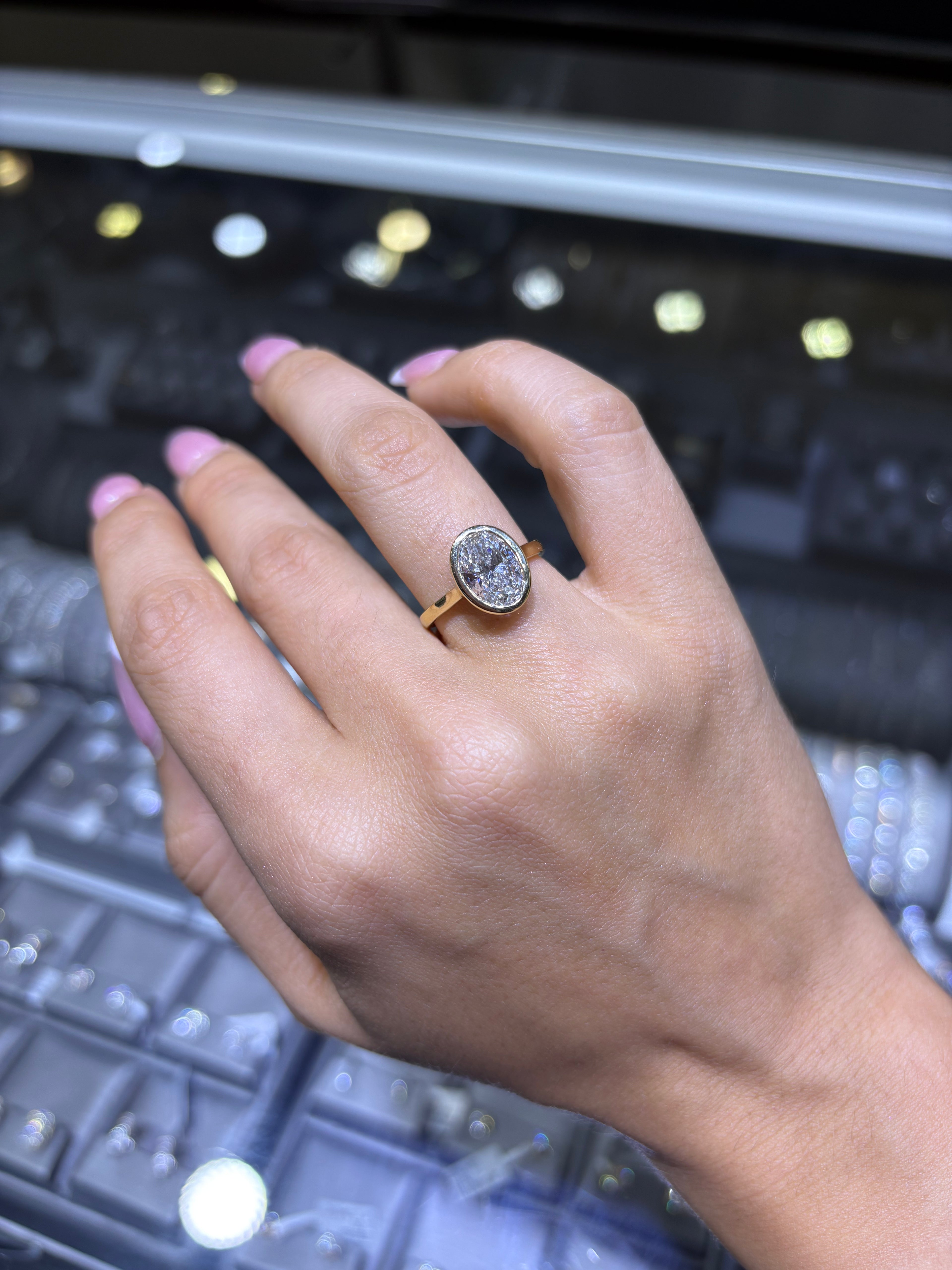 2.50 CT BEZEL-SET OVAL BRILLIANT LAB DIAMOND RING • F COLOR • 14K YELLOW GOLD • VS1 • IGI CERTIFIed