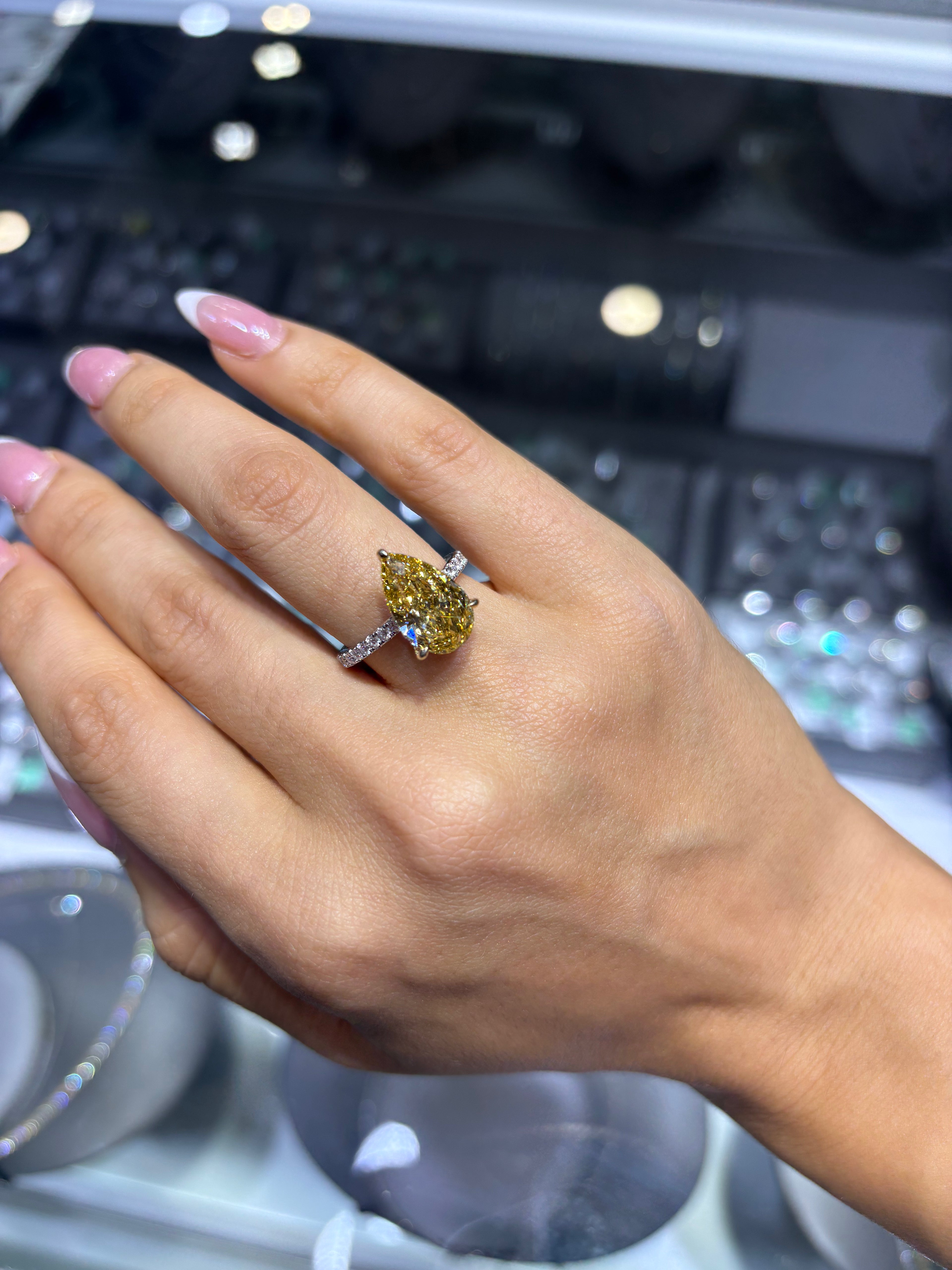 5.50 CT PEAR LAB DIAMOND RING • 5.04 CT CENTER • FANCY YELLOW • IGI CERTIFICATE INCLUDED