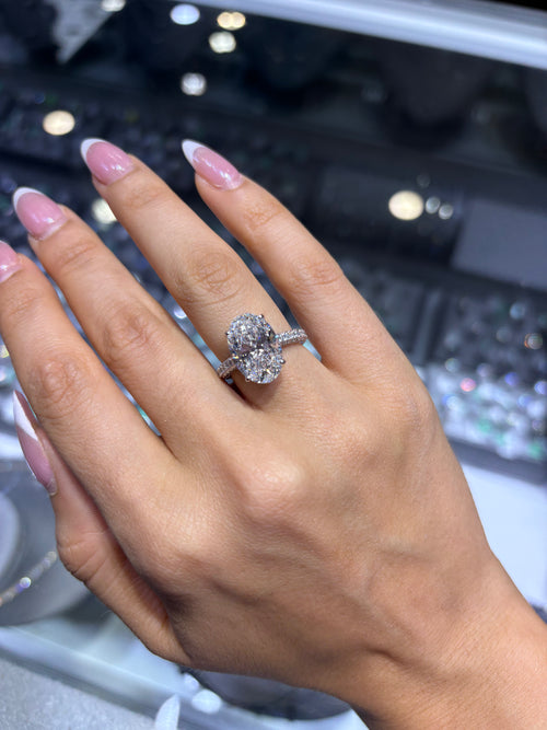 7.97 CT OVAL BRILLIANT LAB DIAMOND RING • 6.05 CT CENTER • E COLOR • 14K WHITE GOLD • VS1 • IGI CERTIFICATE INCLUDED
